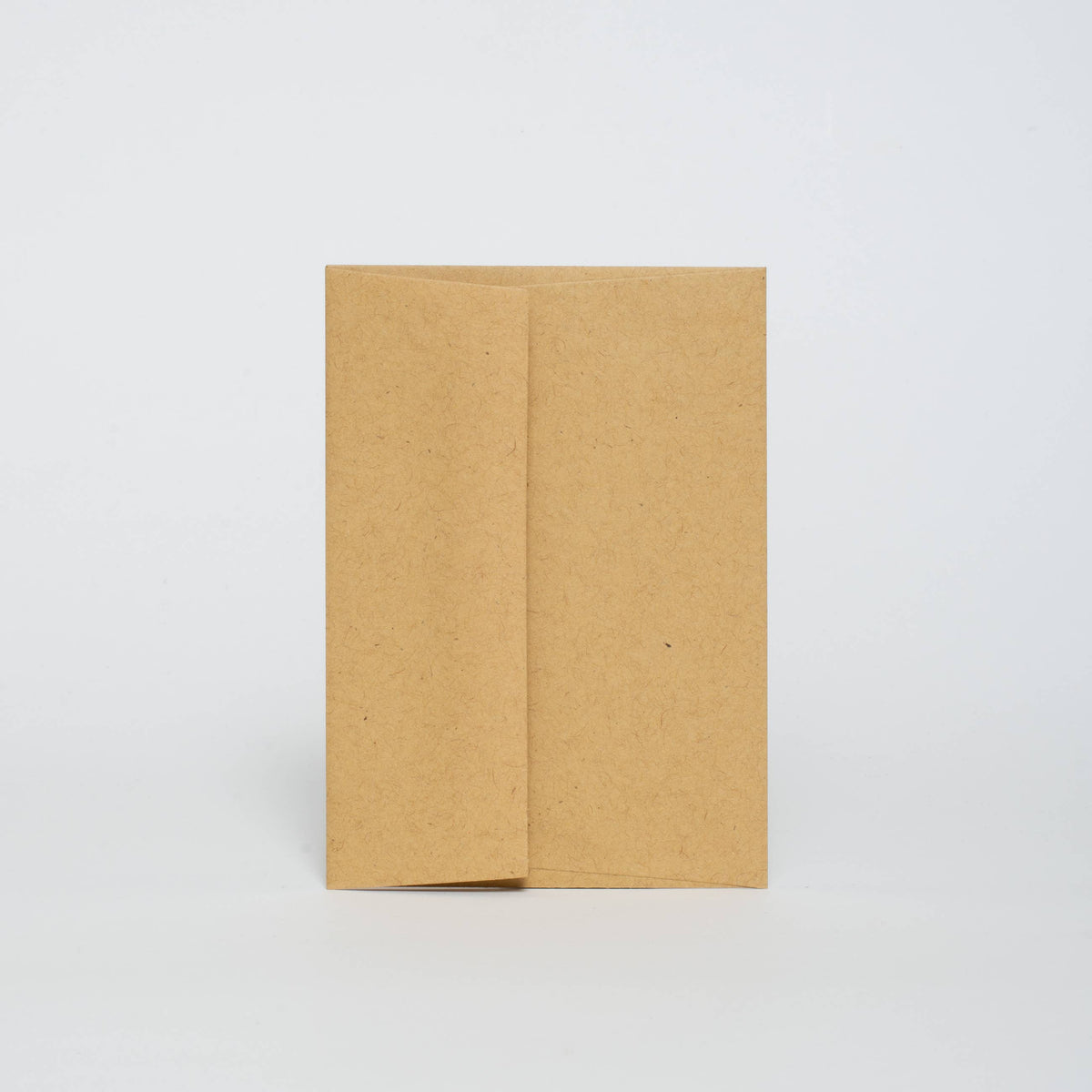 a brown paper envelope on a light gray background