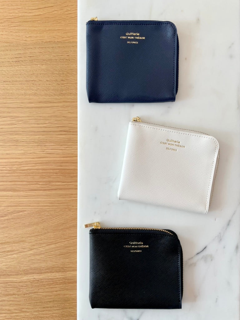 Quitterie Half Zip Wallet – White